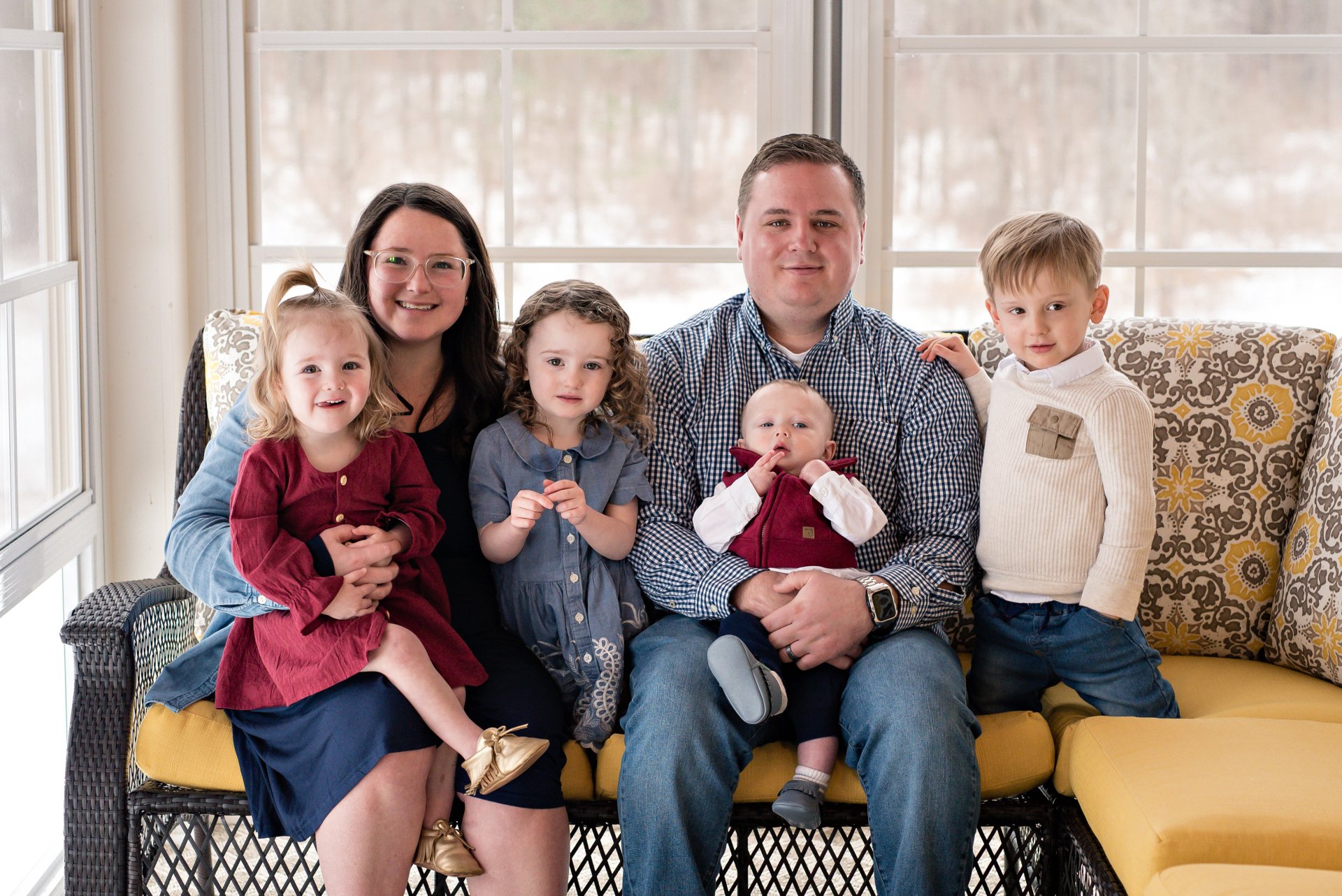 Pastor Doyle Ross III with his wife Tayler and their four children
